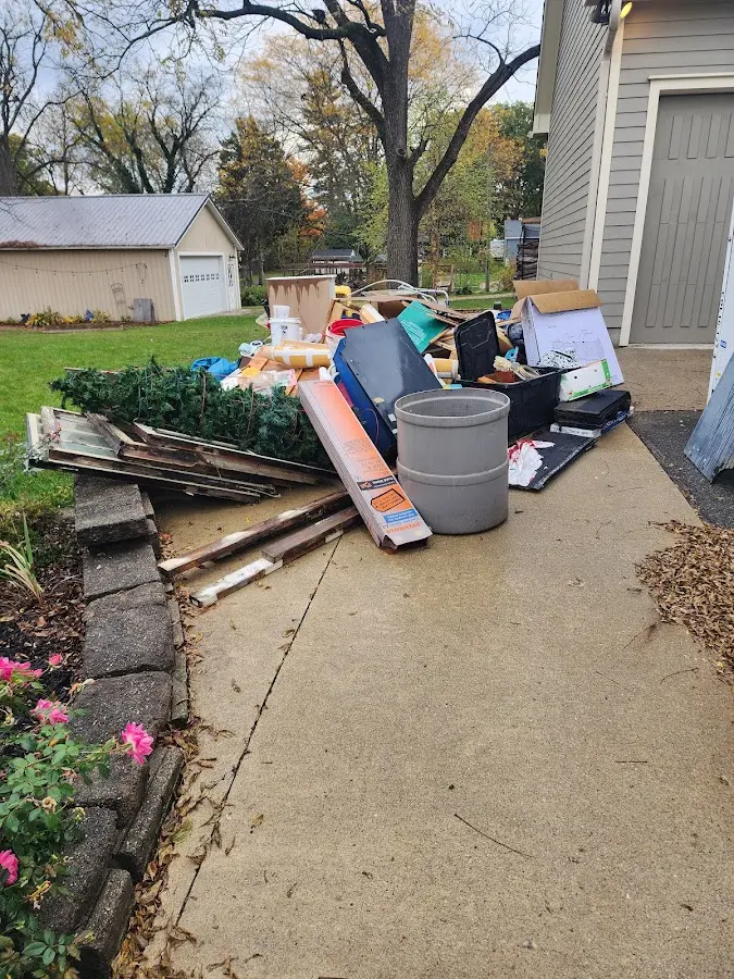 Dumpster being loaded with debris for Demolition Dumpster Rental in Rocky Ford